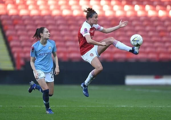 A Tight Battle: Veje vs. Wullaert in the Arsenal vs. Manchester City FA WSL Continental Cup Final