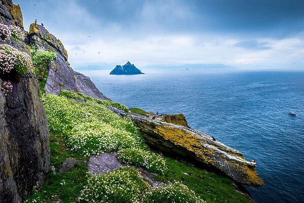 Skellig Islands, County Kerry, Munster Province, Ireland. View of Little Skellig from Skellig Michael island (Great Skelling) with lots of puffins