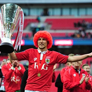 Bristol City's Luke Ayling Lifts the Johnstone Paint Trophy: A Triumphant Moment at Wembley