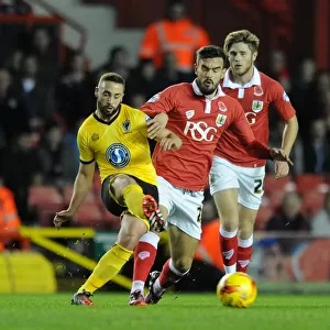 Marlon Pack of Bristol City Closes In on Sammy Moore of AFC Wimbledon during Johnstone's Paint Trophy Match