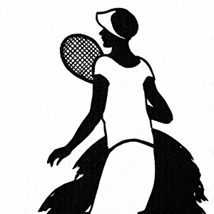 Silhouette of a woman playing tennis