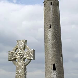 Kilmacdaugh Round Tower and Celtic style cross