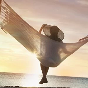 Woman on a hammock on the beach, Florida, United States of America, North America