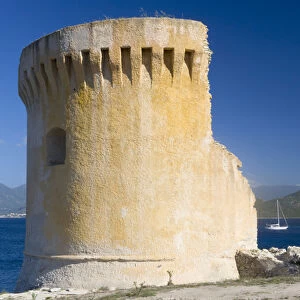 Corsica. France. Europe. Ruins of Genoese tower on Point Mortella (Punta Mortella)
