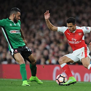 Arsenal vs. Lincoln City: Tense Clash Between Alexis Sanchez and Nathan Arnold in FA Cup Quarter-Final