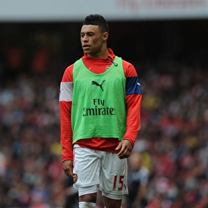 Arsenal's Alex Oxlade-Chamberlain in Action During Premier League Clash Against West Bromwich Albion (2014/15)