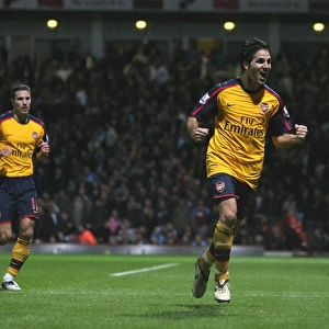Cesc Fabregas celebrates the 2nd Arsenal goal scored