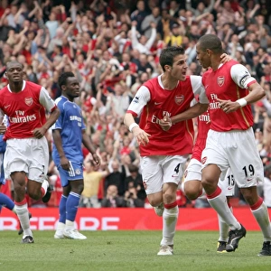 Gilberto celebrates scoring Arsenals goal with Cesc Fabregas