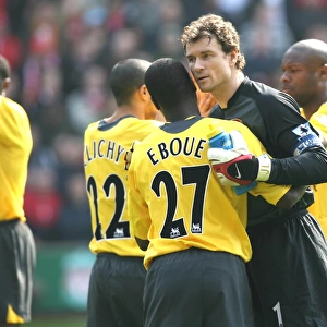 Jens Lehmann and Emmanuel Eboue (Arsenal)