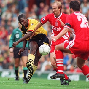 Kevin Campbell (Arsenal) and Mark Wright and Neil Ruddock (Liverpool)