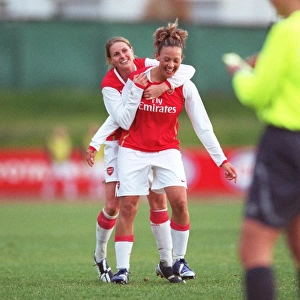 Lianne Sanderson celebrates scoring her goal for Arsenal with Kelly Smith