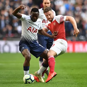 Mustafi vs. Wanyama: Intense Battle in the Premier League Clash Between Arsenal and Tottenham