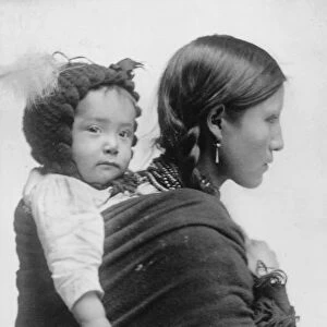 Native American woman from the Plains region, half-length portrait, facing right
