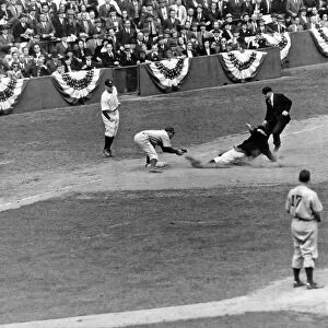 Spud Chandler is out at third in the second game of the 1941 Wor