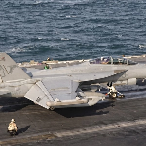 An EA-18G Growler is ready for a mission aboard USS George H. W. Bush