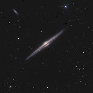 NGC 4565, an edge-on unbarred spiral galaxy in the constellation Coma Berenices