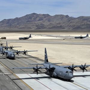 Seven C-130J Super Hercules taxiing at Creech Air Force Base