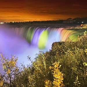 Horseshoe falls lit up at night; Niagara falls ontario canada