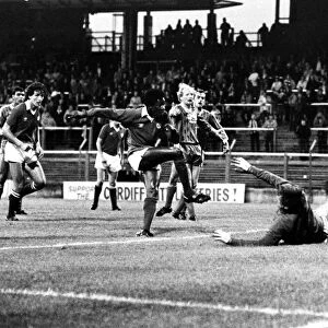 ) watches as Dave Bennett scores against Hereford goalkeeper John Jackson. Aug 1982