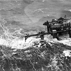 Waves 25 ft. high devastating the oil rig "Ocean Prince"P004429