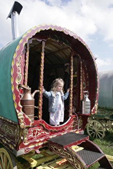 <b class=qtipBold><figcaption>Gypsy caravan</figcaption></b><br>A young visitor to the Gypsy horse fair held at Stow on the Wold in the Cotswolds Gloucestershire England UK. The gypsy come from all over the country in caravan to sell there horse.<br><em>© Paul Felix Photography Springfield Cottage Midwinter Road Northleach GlosGL54 3JD photos@paulfelix.co.uk 01451861893</em> Gypsy caravan