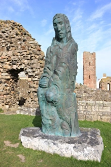 <b class=qtipBold><figcaption>Holy Island</figcaption></b><br>A statue of Saint Cuthbert at Lindisfarne Priory on Holy Island<br><em>© Paul Felix Photography Twelve Beacon Park Pelynt nr Looe Cornwall PL13 2PQ photos@paulfelix.co.uk 01503 221069</em> Holy Island