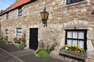 <b class=qtipBold><figcaption>Holy Island</figcaption></b><br>A cottage beside Lindisfarne Priory on Holy Island<br><em>© Paul Felix Photography Twelve Beacon Park Pelynt nr Looe Cornwall PL13 2PQ photos@paulfelix.co.uk 01503 221069</em> Holy Island