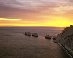 <b class=qtipBold><figcaption>The Needles</figcaption></b><br>The sunset over The Needles on the Isle of Wight on a spring evening<br><em>© Paul Felix Photography Twelve Beacon Park Pelynt nr Looe Cornwall PL13 2PQ photos@paulfelix.co.uk 01503 221069</em> The Needles