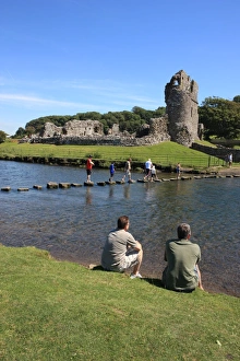 <b class=qtipBold><figcaption>Ogmore Castle</figcaption></b><br>The Stepping stones over the river below the Ruins of Ogmore Castle in South Wales<br><em>© Paul Felix Photography Twelve Beacon Park Pelynt nr Looe Cornwall PL13 2PQ photos@paulfelix.co.uk 01503 221069</em> Ogmore Castle