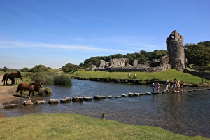 <b class=qtipBold><figcaption>Ogmore Castle</figcaption></b><br>The Stepping stones over the river below the Ruins of Ogmore Castle in South Wales<br><em>© Paul Felix Photography Twelve Beacon Park Pelynt nr Looe Cornwall PL13 2PQ photos@paulfelix.co.uk 01503 221069</em> Ogmore Castle