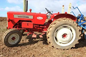 <b class=qtipBold><figcaption>Ploughing Match</figcaption></b><br>Vintage British-built Mc Cormick International B414 tractor was introduced in 1961 Ploughing Match at Pelynt near Looe in Cornwall on a autumn day<br><em>© Paul Felix Photography Twelve Beacon Park Pelynt nr Looe Cornwall PL13 2PQ photos@paulfelix.co.uk 01503 221069</em> Ploughing Match