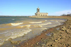 <b class=qtipBold><figcaption>Rutland Water</figcaption></b><br>Normanton Church Museum on the edge of Rutland Water on a winters day. Rutland's most famous landmark was saved from flooding when Rutland Water was created in the 1970s. Now with the floor raised almost half way up the church, it is a museum which houses dinosaur fossils and an Anglo-Saxon skeleton from the reservoir.<br><em>© Paul Felix Photography Twelve Beacon Park Pelynt nr Looe Cornwall PL13 2PQ photos@paulfelix.co.uk 01503 221069</em> Rutland Water