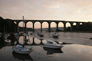 <b class=qtipBold><figcaption>St Germans</figcaption></b><br>Early morning at low tide on the river below the rail Viaduct at St Germans in Cornwallwith its quayside and boats<br><em>© Paul Felix Photography Twelve Beacon Park Pelynt nr Looe Cornwall PL13 2PQ photos@paulfelix.co.uk 01503 221069</em> St Germans
