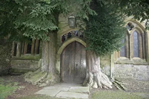 <b class=qtipBold><figcaption>Stow on the Wold</figcaption></b><br>The North Door Way with its Yew trees at church in the cotswold town of Stow on the Wold Gloucestershire<br><em>© Paul Felix Photography Twelve Beacon Park Pelynt nr Looe Cornwall PL13 2PQ photos@paulfelix.co.uk 01503 221069</em> Stow on the Wold