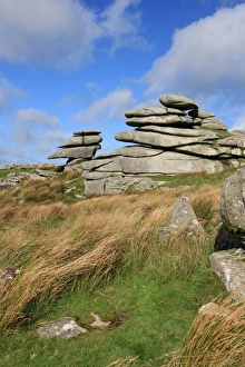 <b class=qtipBold><figcaption>Windswept stones</figcaption></b><br>A Windswept stones shaped by the wind over years, high on Bodmin Moor below the Cheesewring a granite tor on the eastern flank of the Moor at Stowe's Hill near Minions. Bodmin Moor has many Tor's, the Chessewring is one of the largest and most visited. A local legend says that the Cheesewring is the result of a contest between a man and a giant. When Christianity had just been introduced to the British Islands. The granite slabs formed by weathering. The name derives from the resemblance of the piled slabs to a cheesewring, a press used to make cheese.<br><em>© Paul Felix Photography Twelve Beacon Park Pelynt nr Looe Cornwall PL13 2PQ</em> Windswept stones