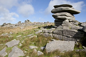 <b class=qtipBold><figcaption>Windswept stones on Bodmin Moor</figcaption></b><br>A Windswept stones called the Chessewring shaped by the wind over years, high on Bodmin Moor below the Cheesewring a granite tor on the eastern flank of the Moor at Stowe's Hill near Minions. Bodmin Moor has many Tor's, the Chessewring is one of the largest and most visited. A local legend says that the Cheesewring is the result of a contest between a man and a giant. When Christianity had just been introduced to the British Islands. The granite slabs formed by weathering. The name derives from the resemblance of the piled slabs to a cheesewring, a press used to make cheese.<br><em>© Paul Felix Photography Twelve Beacon Park Pelynt nr Looe Cornwall PL13 2PQ</em> Windswept stones on Bodmin Moor