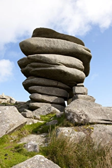 <b class=qtipBold><figcaption>Windswept stones on Bodmin Moor</figcaption></b><br>A Windswept stones called the Chessewring shaped by the wind over years, high on Bodmin Moor below the Cheesewring a granite tor on the eastern flank of the Moor at Stowe's Hill near Minions. Bodmin Moor has many Tor's, the Chessewring is one of the largest and most visited. A local legend says that the Cheesewring is the result of a contest between a man and a giant. When Christianity had just been introduced to the British Islands. The granite slabs formed by weathering. The name derives from the resemblance of the piled slabs to a cheesewring, a press used to make cheese.<br><em>© Paul Felix Photography Twelve Beacon Park Pelynt nr Looe Cornwall PL13 2PQ</em> Windswept stones on Bodmin Moor