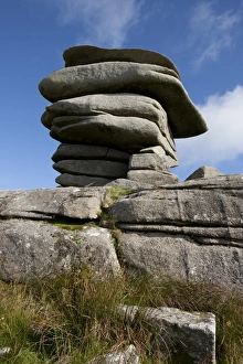<b class=qtipBold><figcaption>Windswept stones on Bodmin Moor</figcaption></b><br>A Windswept stones called the Chessewring shaped by the wind over years, high on Bodmin Moor below the Cheesewring a granite tor on the eastern flank of the Moor at Stowe's Hill near Minions. Bodmin Moor has many Tor's, the Chessewring is one of the largest and most visited. A local legend says that the Cheesewring is the result of a contest between a man and a giant. When Christianity had just been introduced to the British Islands. The granite slabs formed by weathering. The name derives from the resemblance of the piled slabs to a cheesewring, a press used to make cheese.<br><em>© Paul Felix Photography Twelve Beacon Park Pelynt nr Looe Cornwall PL13 2PQ</em> Windswept stones on Bodmin Moor